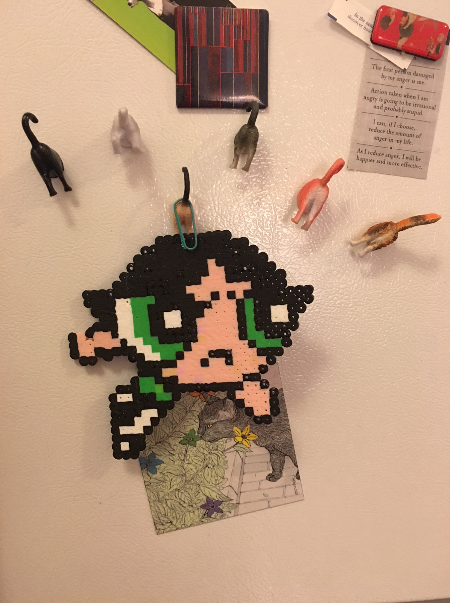 Accidental refrigerator still life: amazing gift of Buttercup Perler art (thanks, Jed), hanging among the gift of cat butts (thanks, Matt), and in dialog with a gift of meditations on anger (thanks, Cecilia)